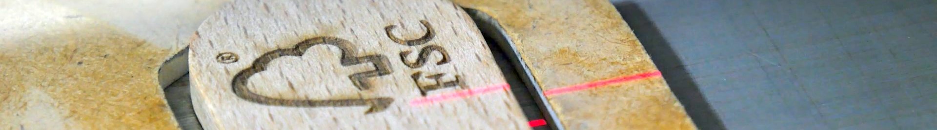 a wooden ladle with FSC logo